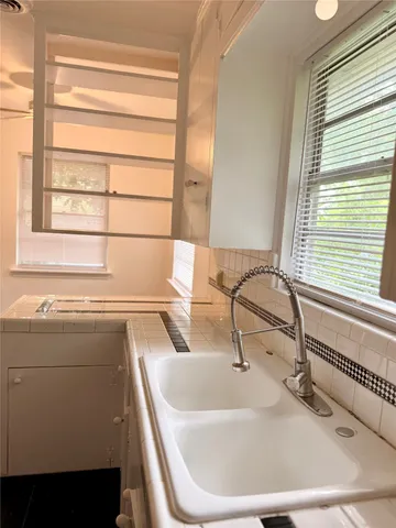 a utility room with washer and dryer