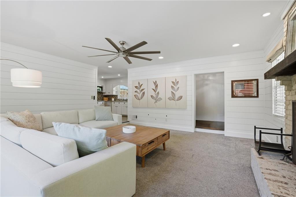 4000 Lower Roswell Road Marietta, GA 30068 - Photo 4 of 25 a living room with furniture and a ceiling fan