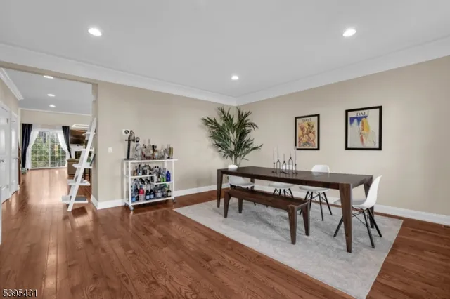 a bathroom with a bathtub sink and mirror