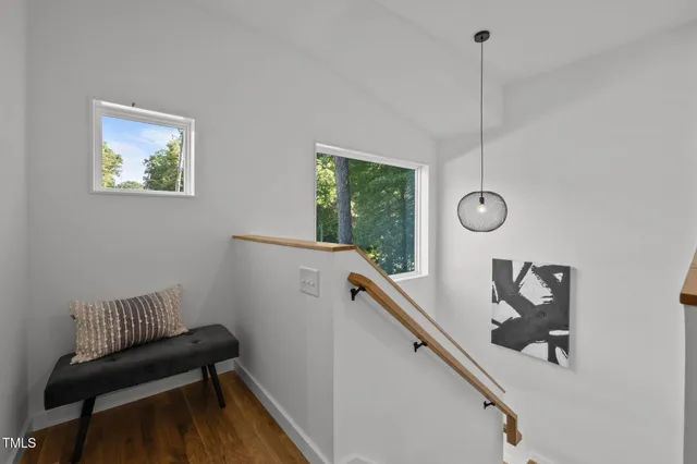 a view of a hallway with windows