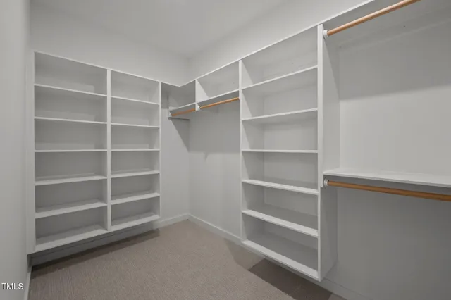 a view of an empty room with empty racks