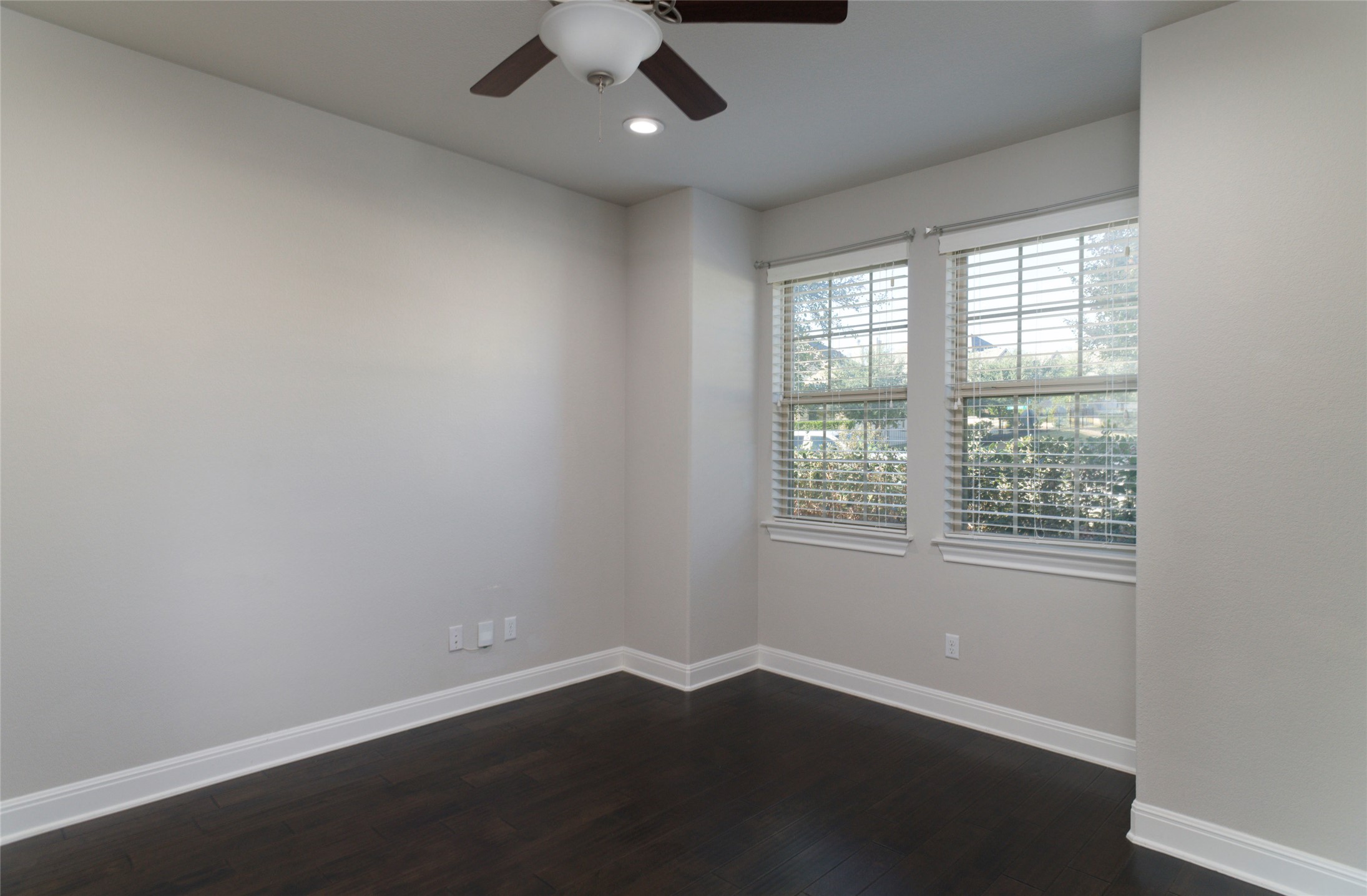4001 Goodnight Trail Leander, TX 78641 - Photo 20 of 35 an empty room with wooden floor and windows