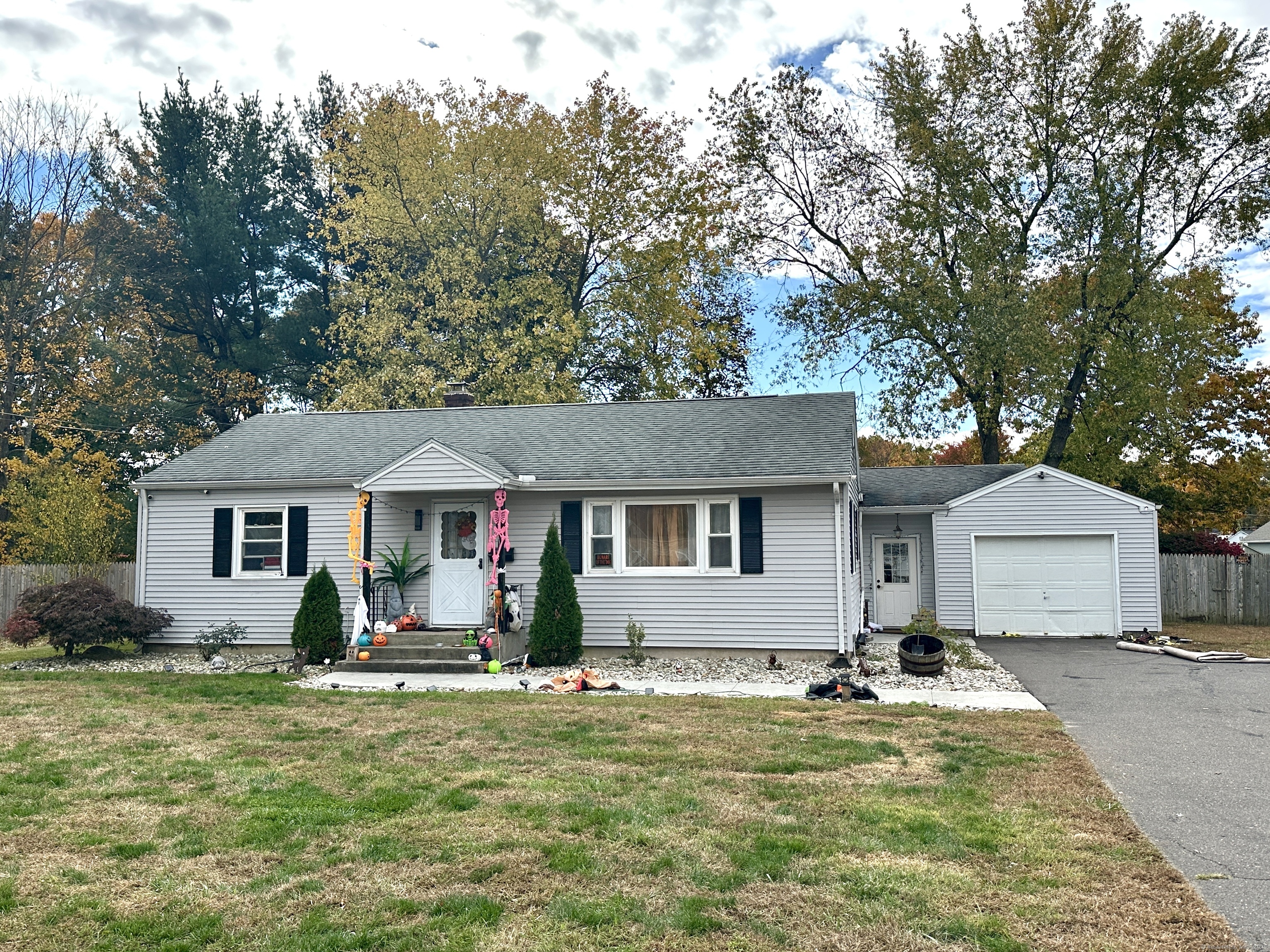 439 Halfway House Road Windsor Locks, CT 06096 - Photo 1 of 1 a front view of house with yard and trees in the background