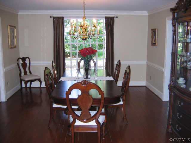10706 Green Mt Road Richmond, VA 23238 - Photo 3 of 9 a view of a dining room with furniture window and outside view