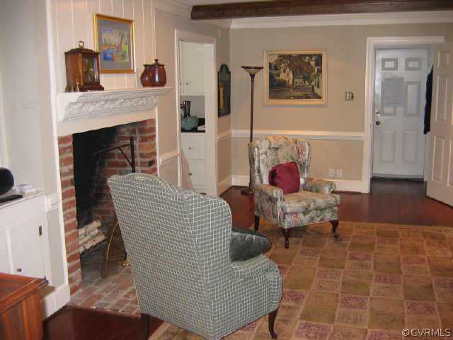 10706 Green Mt Road Richmond, VA 23238 - Photo 5 of 9 a living room with furniture and a fireplace