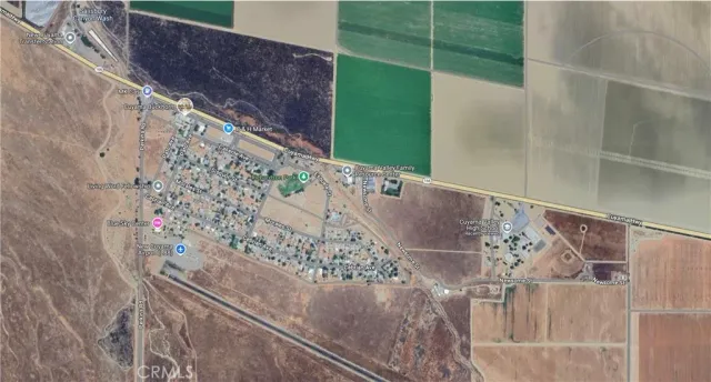 a very nice looking living room with furniture and a large window