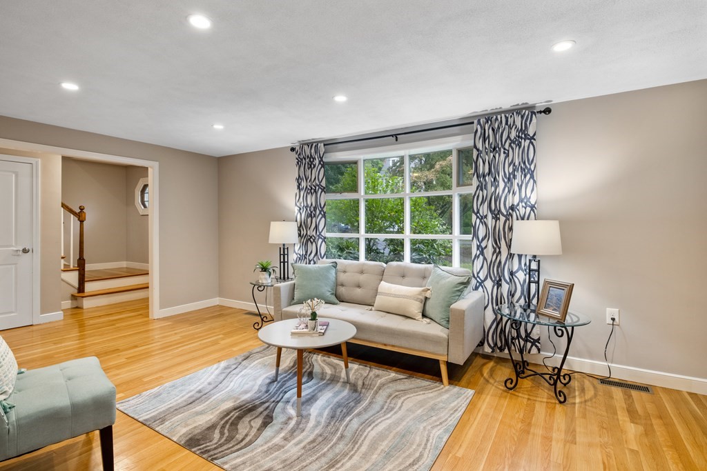 34 Tower Road Lexington, MA 02421 - Photo 5 of 35 a living room with furniture and a table
