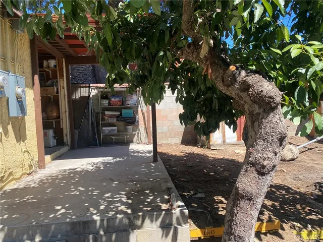 a bathroom with a sink and a washing machine in it