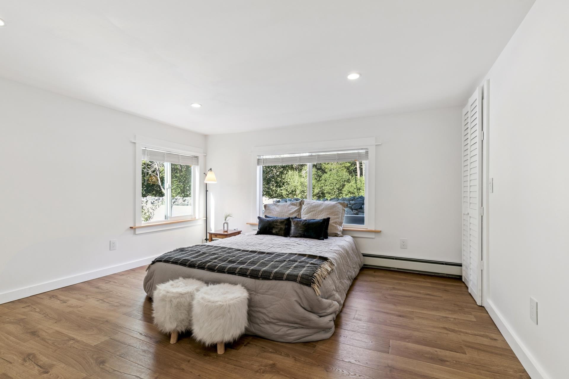 7594-7598 River Road Truckee, CA 96161 - Photo 11 of 27 a bed room with a bed and a window