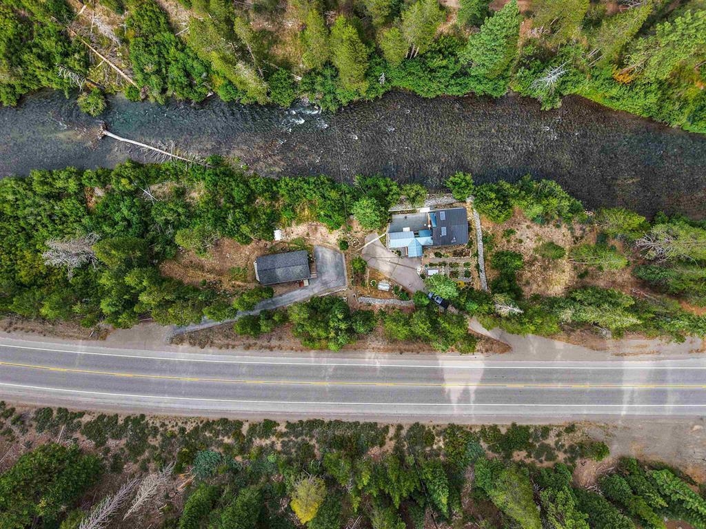 7594-7598 River Road Truckee, CA 96161 - Photo 27 of 27 an aerial view of a house with a yard and garden