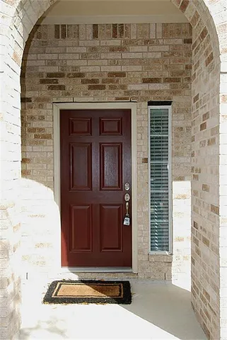 a view of entryway with front door