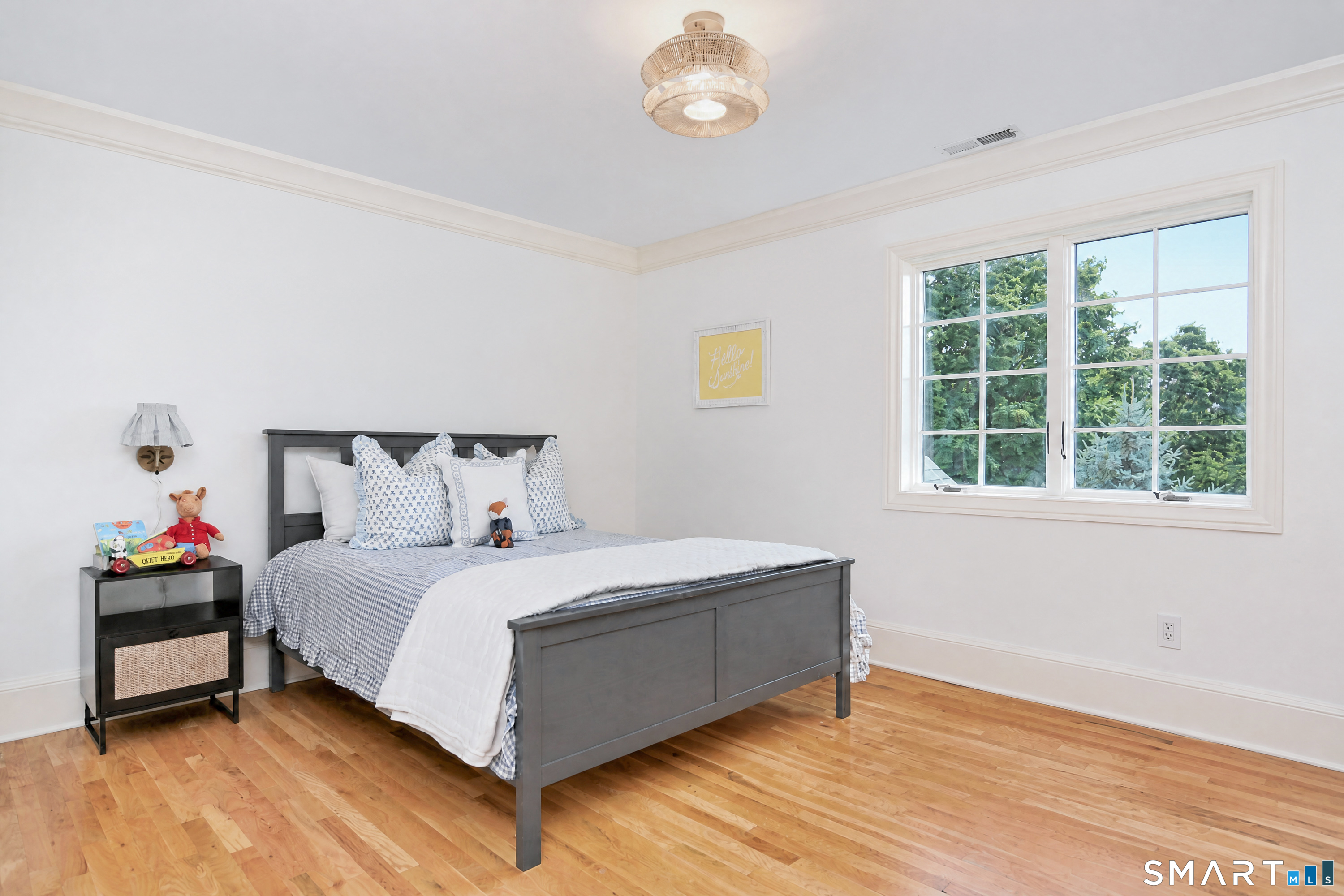 17 Kent Road Newtown, CT 06470 - Photo 24 of 40 Bright bedroom with hardwood floors and a large window.
