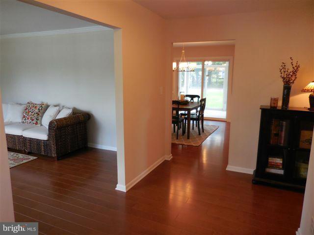 517 Shipley Road Linthicum, MD 21090 - Photo 4 of 30 a view of a livingroom with furniture and hardwood floor