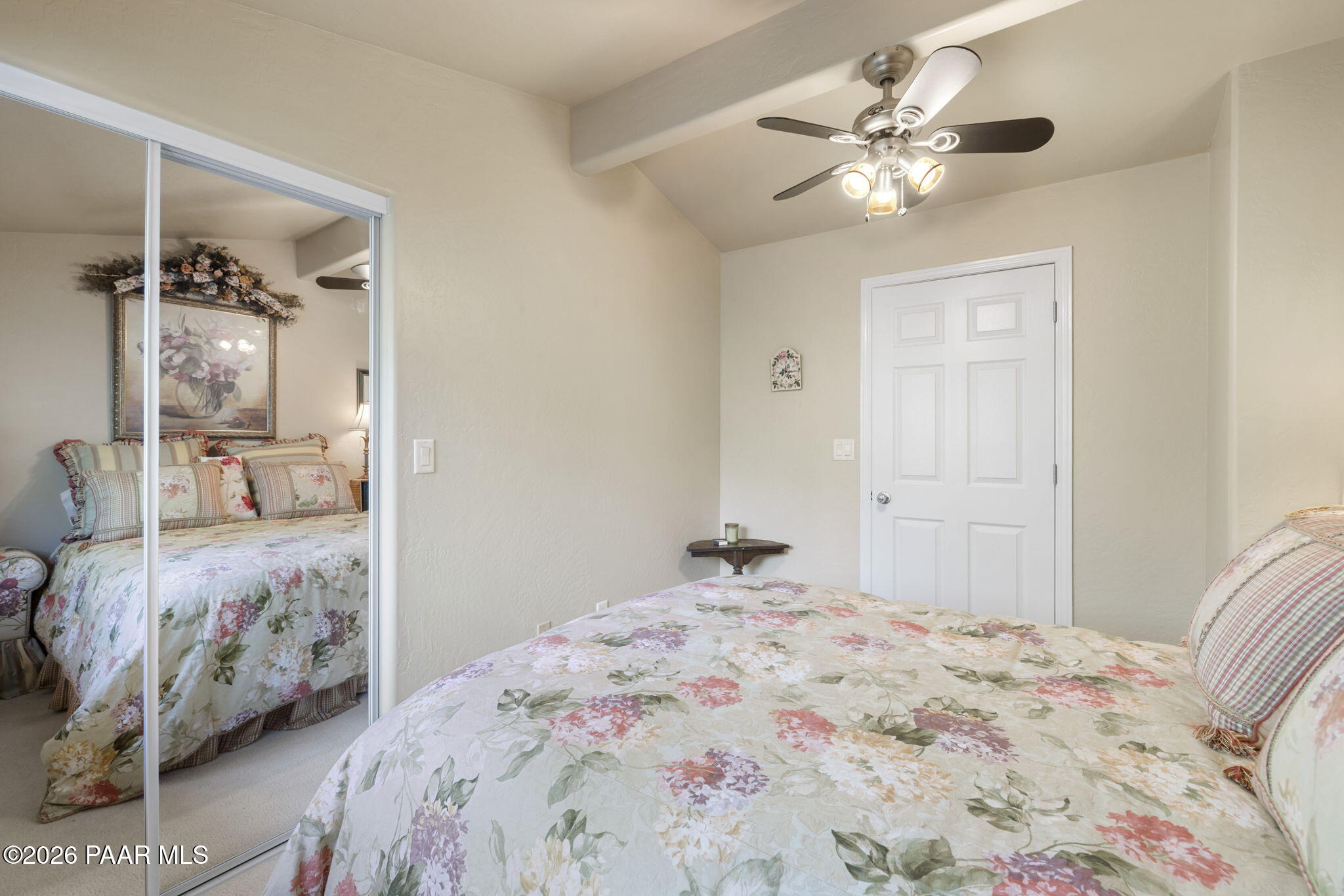 535 Copper Basin Road Prescott, AZ 86303 - Photo 25 of 41 a bedroom with a large bed and a chandelier
