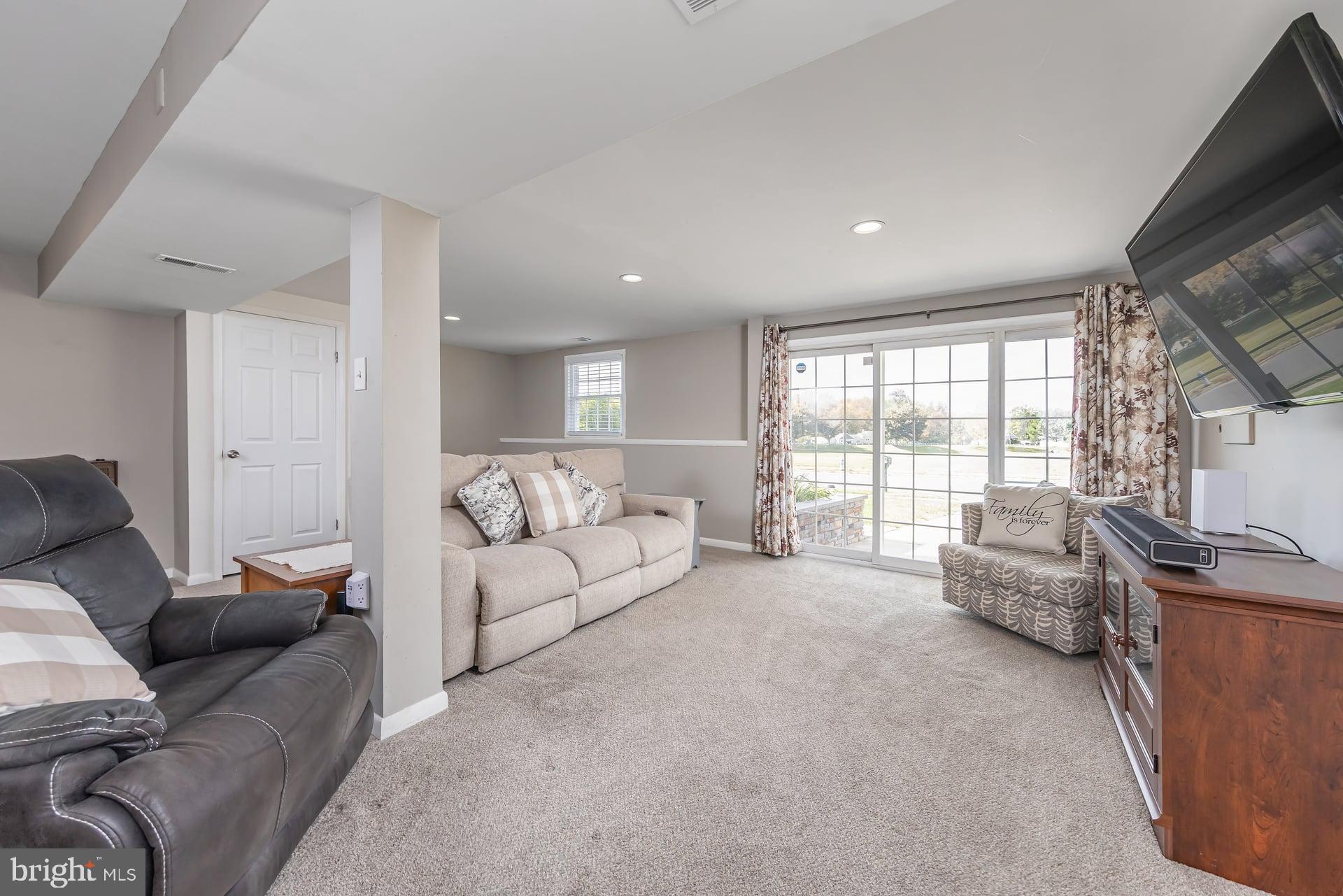 412 Aberdeen Road Williamstown, NJ 08094 - Photo 20 of 22 a living room with furniture and a flat screen tv