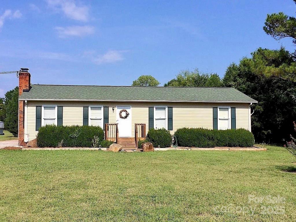 3129 Sims Road Rock Hill, SC 29730 - Photo 1 of 23 a front view of a house with garden