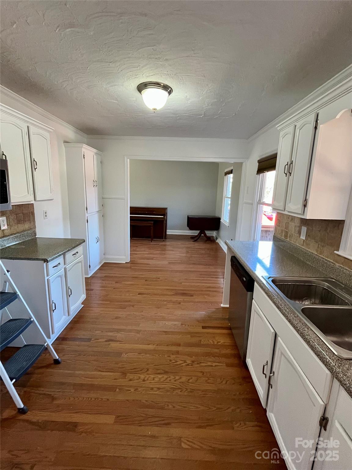 3129 Sims Road Rock Hill, SC 29730 - Photo 7 of 23 a large kitchen with a stove and a sink