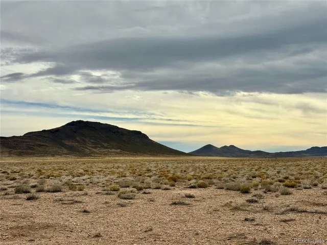 a view of lake with mountain