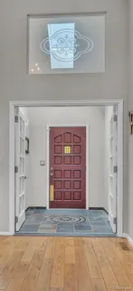 a view of entryway with a hallway