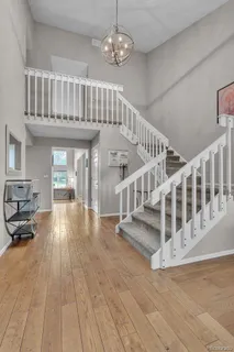 a view of entryway with wooden floor