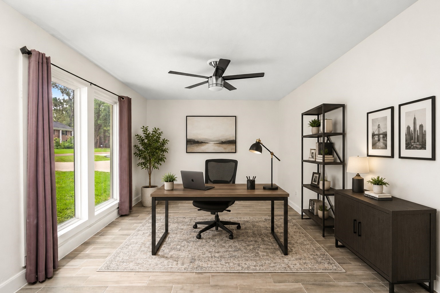 560 Landfall Lane Conroe, TX 77302 - Photo 4 of 41 Formal living room staged as an office with large windows and natural light. This flex space could be a main-floor playroom or game room.