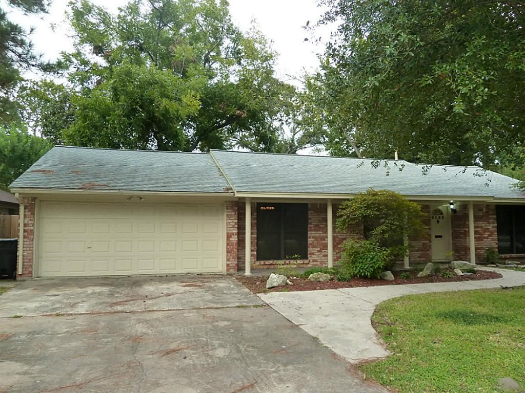 9122 Western Drive Houston, TX 77080 - Photo 1 of 20 a front view of a house with a yard