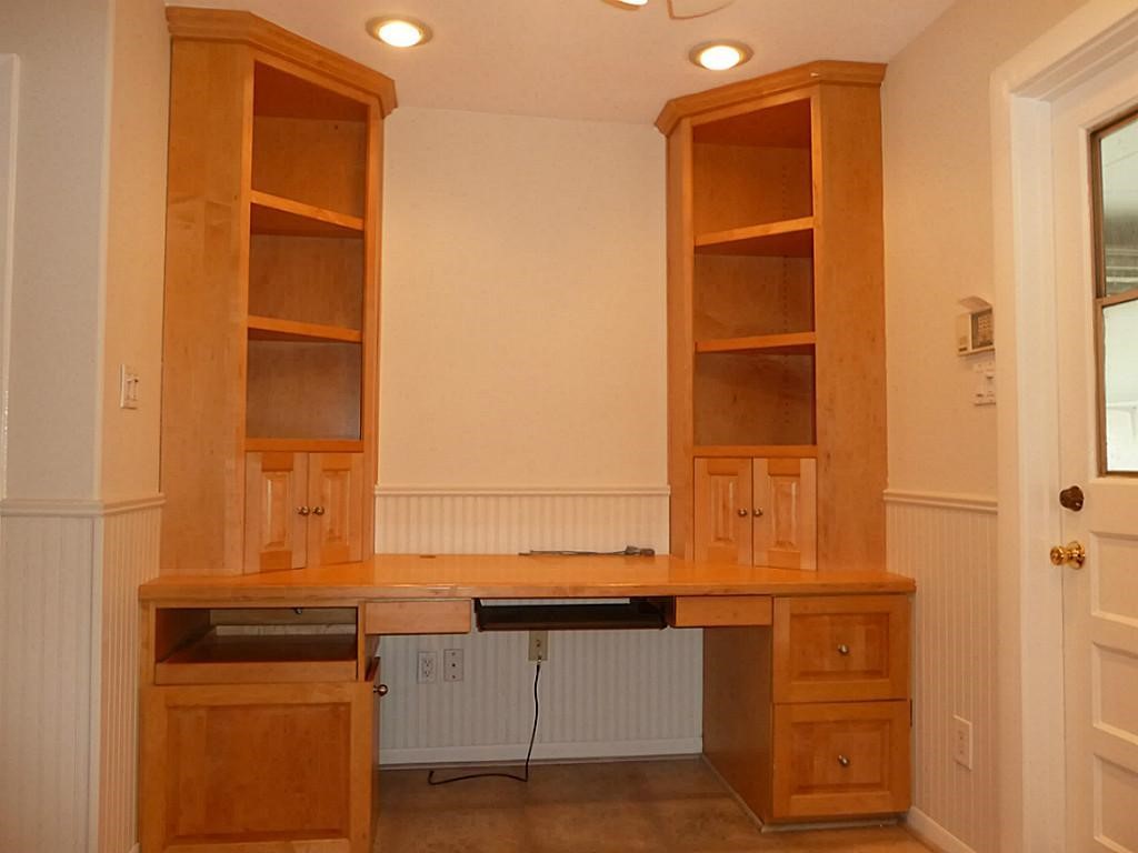 9122 Western Drive Houston, TX 77080 - Photo 12 of 20 a view of walk in closet with empty racks