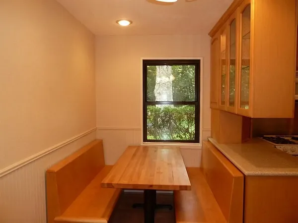 a view of a kitchen with a sink and dishwasher