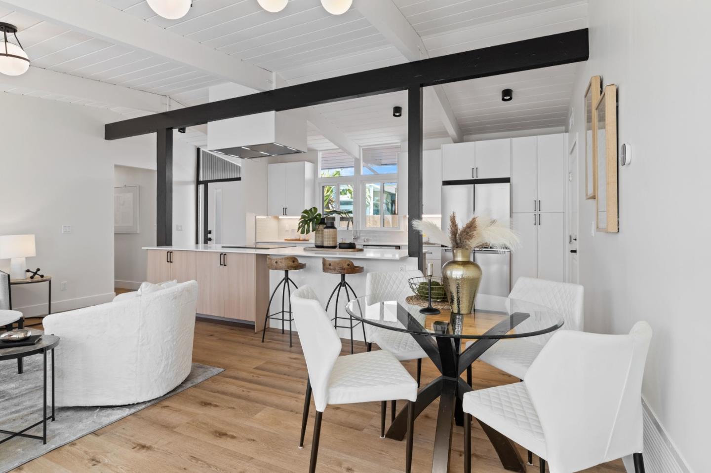 1734 Wolfe Drive San Mateo, CA 94402 - Photo 18 of 43 a view of a dining room with furniture and a large window