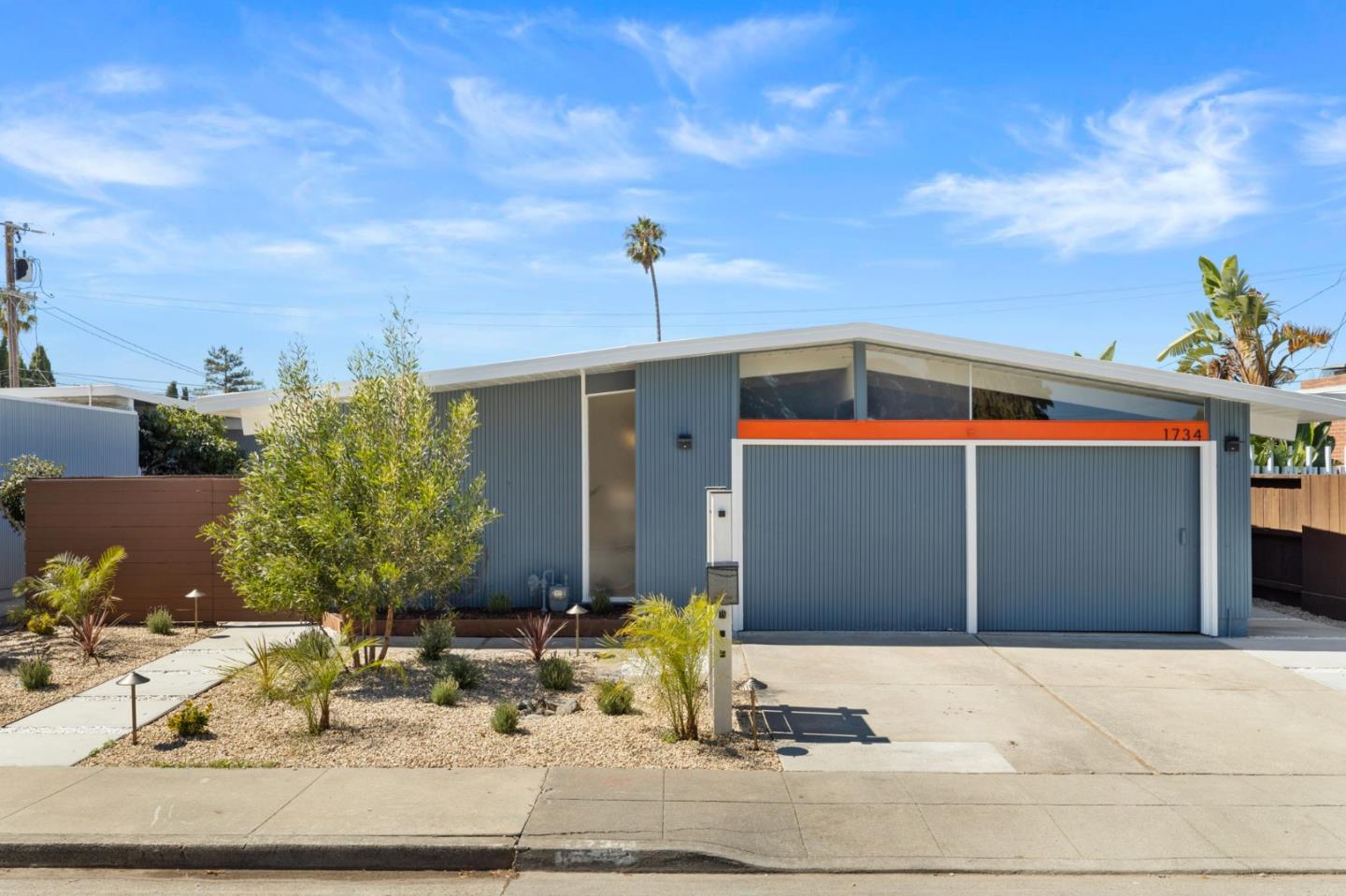 1734 Wolfe Drive San Mateo, CA 94402 - Photo 2 of 43 a view of a house with a patio