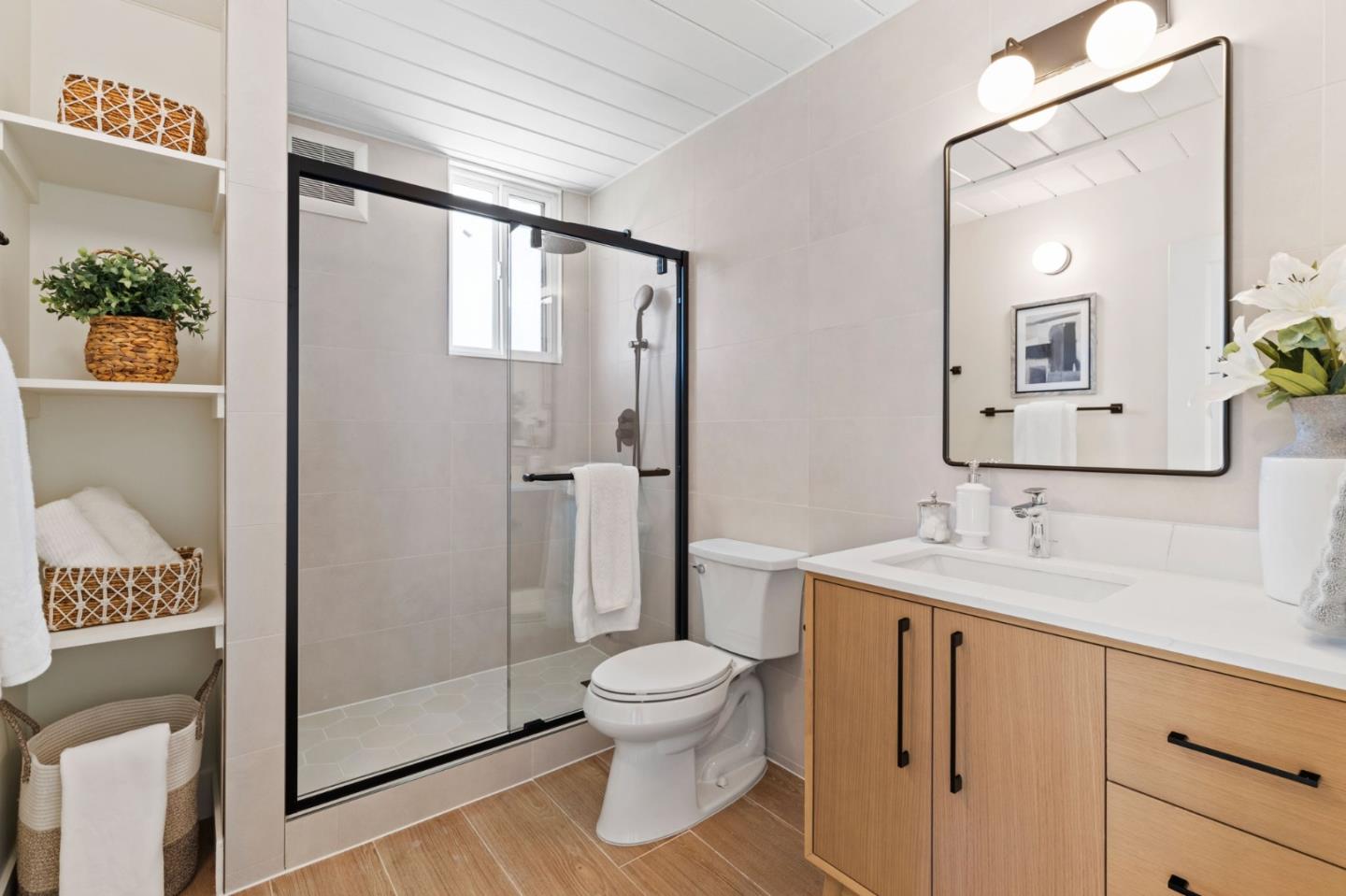 1734 Wolfe Drive San Mateo, CA 94402 - Photo 29 of 43 a bathroom with a toilet sink and shower