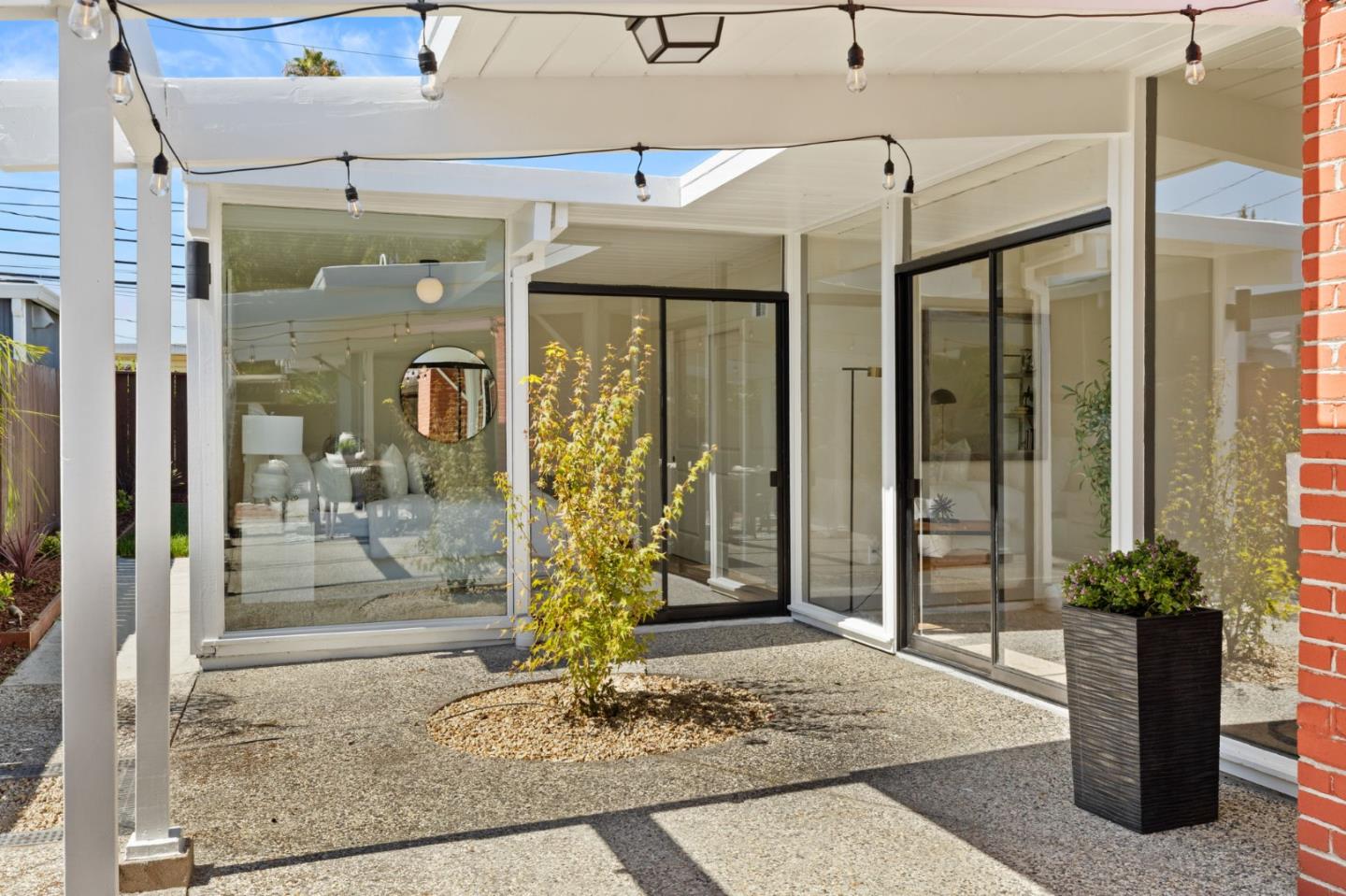 1734 Wolfe Drive San Mateo, CA 94402 - Photo 31 of 43 a front view of a house