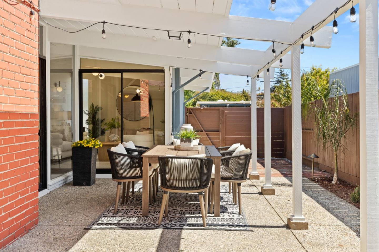 1734 Wolfe Drive San Mateo, CA 94402 - Photo 33 of 43 a view of an outdoor dining space with a patio