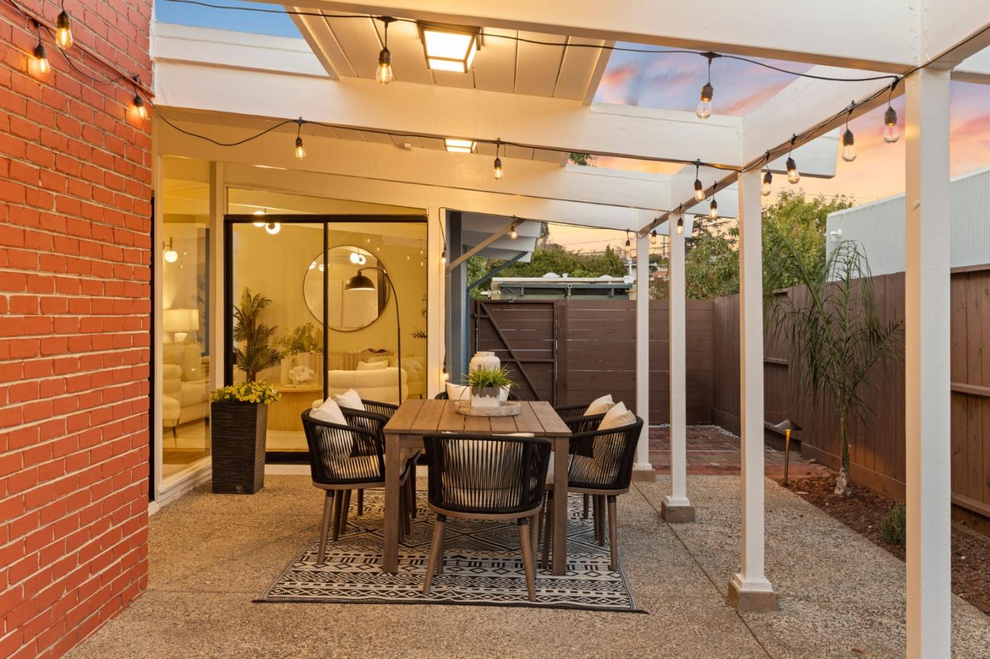 1734 Wolfe Drive San Mateo, CA 94402 - Photo 41 of 43 a patio with yard glass top table and chairs
