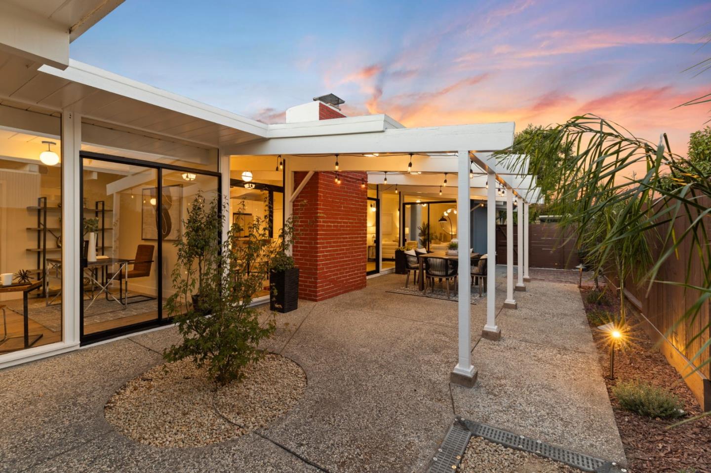 1734 Wolfe Drive San Mateo, CA 94402 - Photo 42 of 43 a view of a porch with furniture and a yard