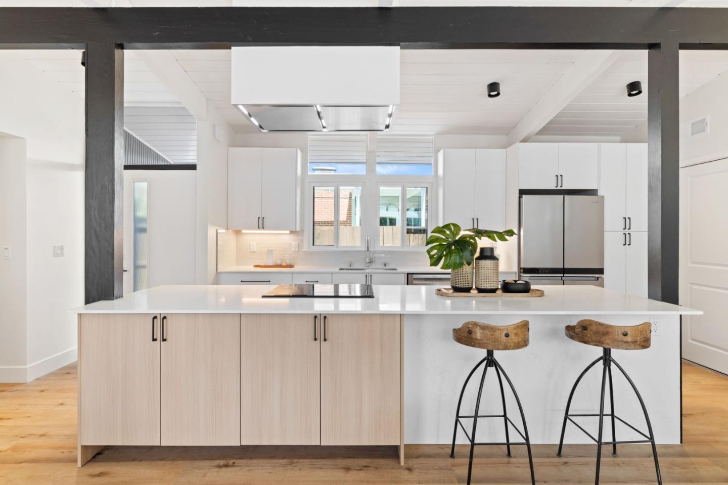 1734 Wolfe Drive San Mateo, CA 94402 - Photo 7 of 43 a kitchen with a table and chairs