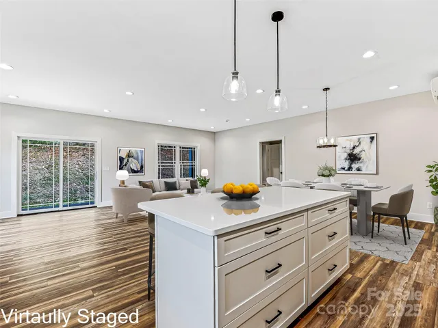 a kitchen that has a lot of cabinets in it