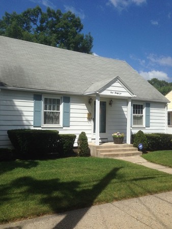 136 Eddy Street Springfield, MA 01104 - Photo 3 of 11 a front view of a house with a yard