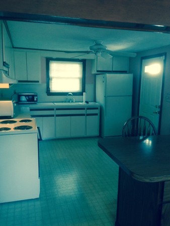 136 Eddy Street Springfield, MA 01104 - Photo 6 of 11 a kitchen with sink and cabinets