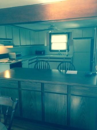 136 Eddy Street Springfield, MA 01104 - Photo 7 of 11 a view of kitchen from a hall with a lake view