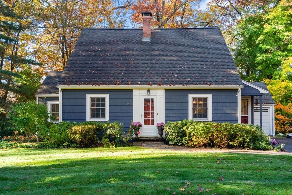 34 Earle Road Wellesley, MA 02481 - Photo 1 of 28 a front view of a house with a yard