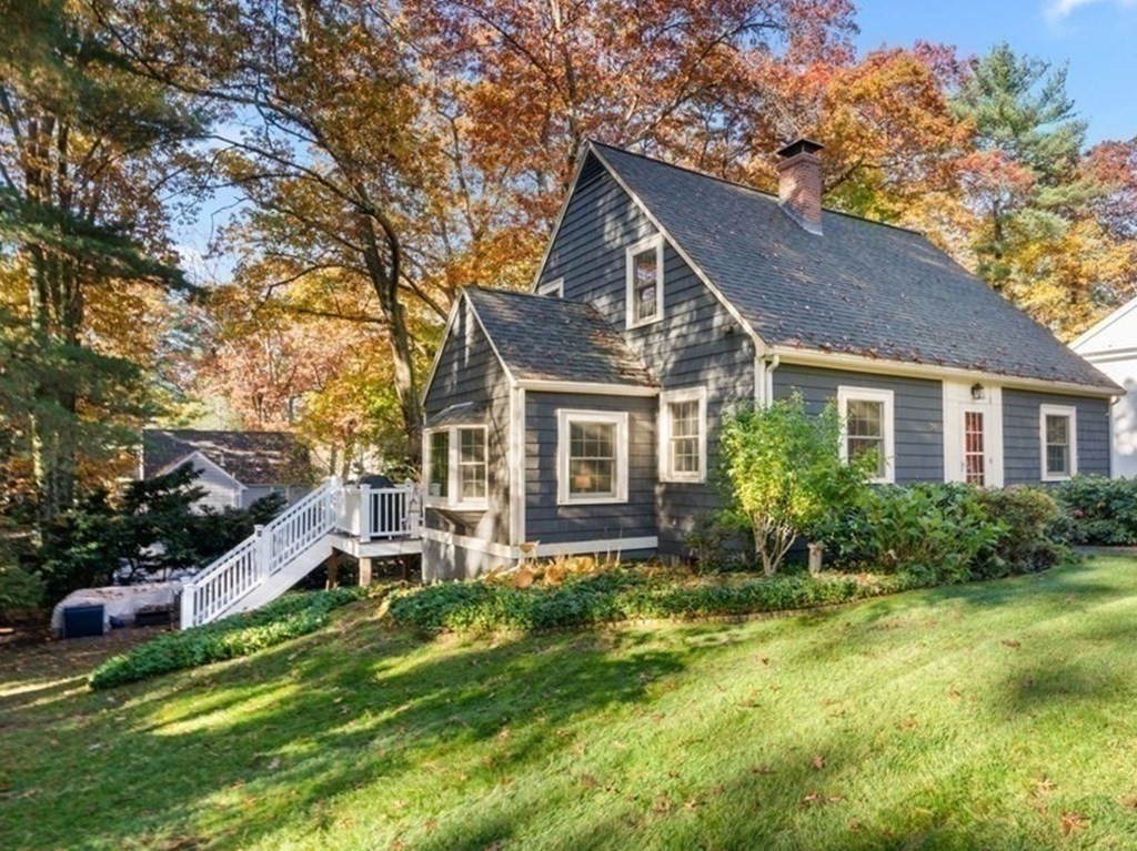 34 Earle Road Wellesley, MA 02481 - Photo 2 of 28 a front view of house with yard and green space