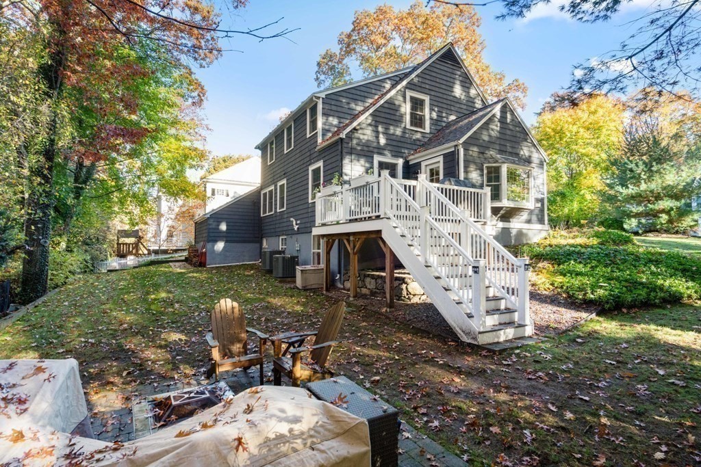 34 Earle Road Wellesley, MA 02481 - Photo 27 of 28 front view of a house with a yard