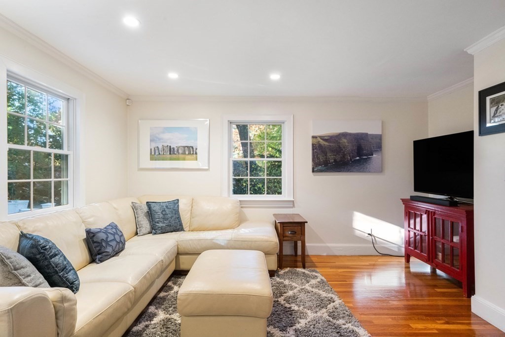 34 Earle Road Wellesley, MA 02481 - Photo 7 of 28 a living room with furniture and a flat screen tv
