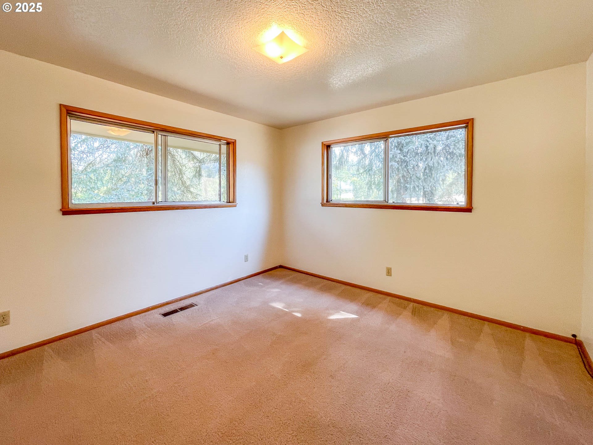 765 O C Brown Road Roseburg, OR 97470 - Photo 18 of 48 an empty room with windows