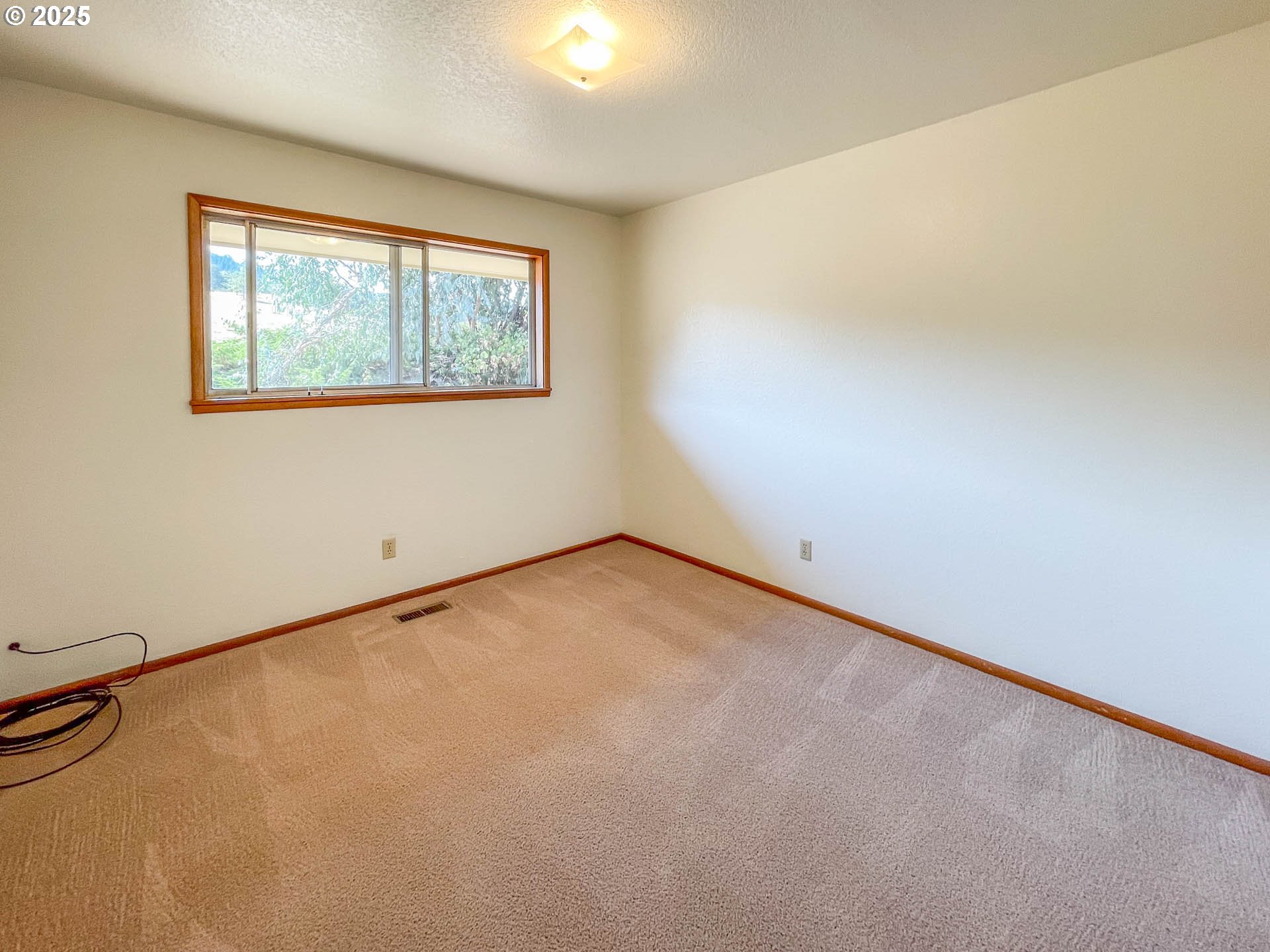 765 O C Brown Road Roseburg, OR 97470 - Photo 23 of 48 an empty room with windows