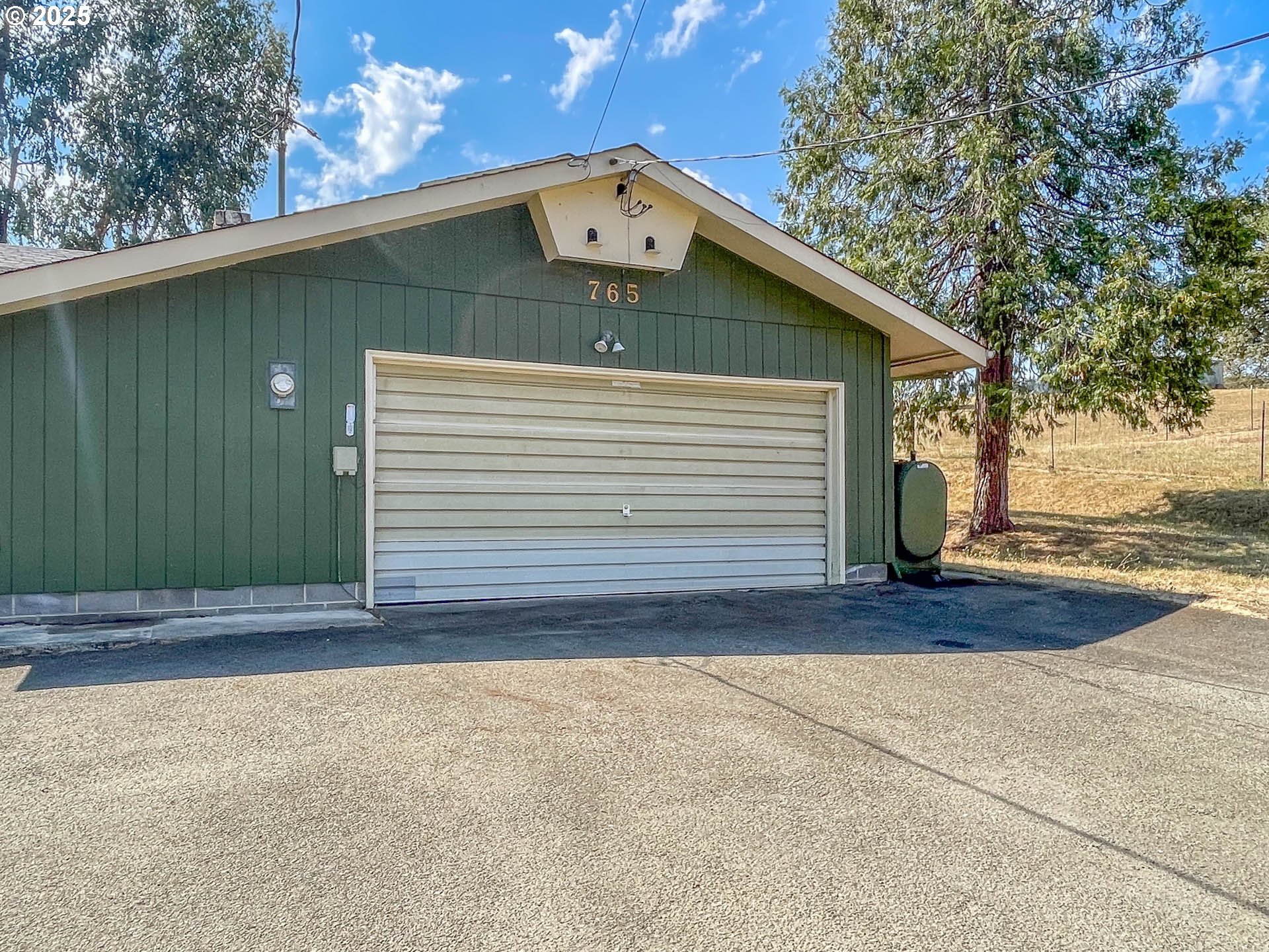 765 O C Brown Road Roseburg, OR 97470 - Photo 30 of 48 a front view of a house with a yard