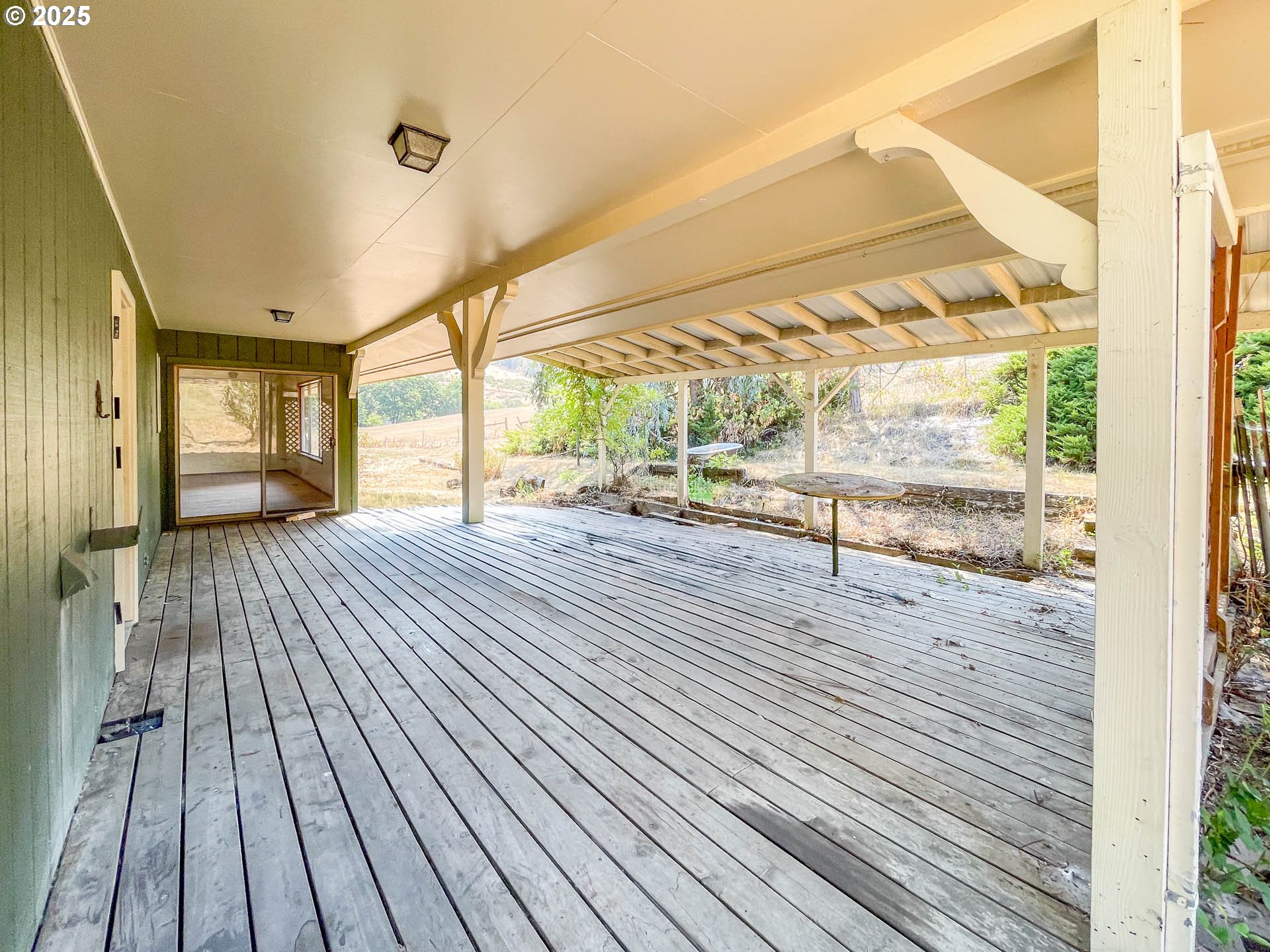 765 O C Brown Road Roseburg, OR 97470 - Photo 32 of 48 a room with wooden floor and windows