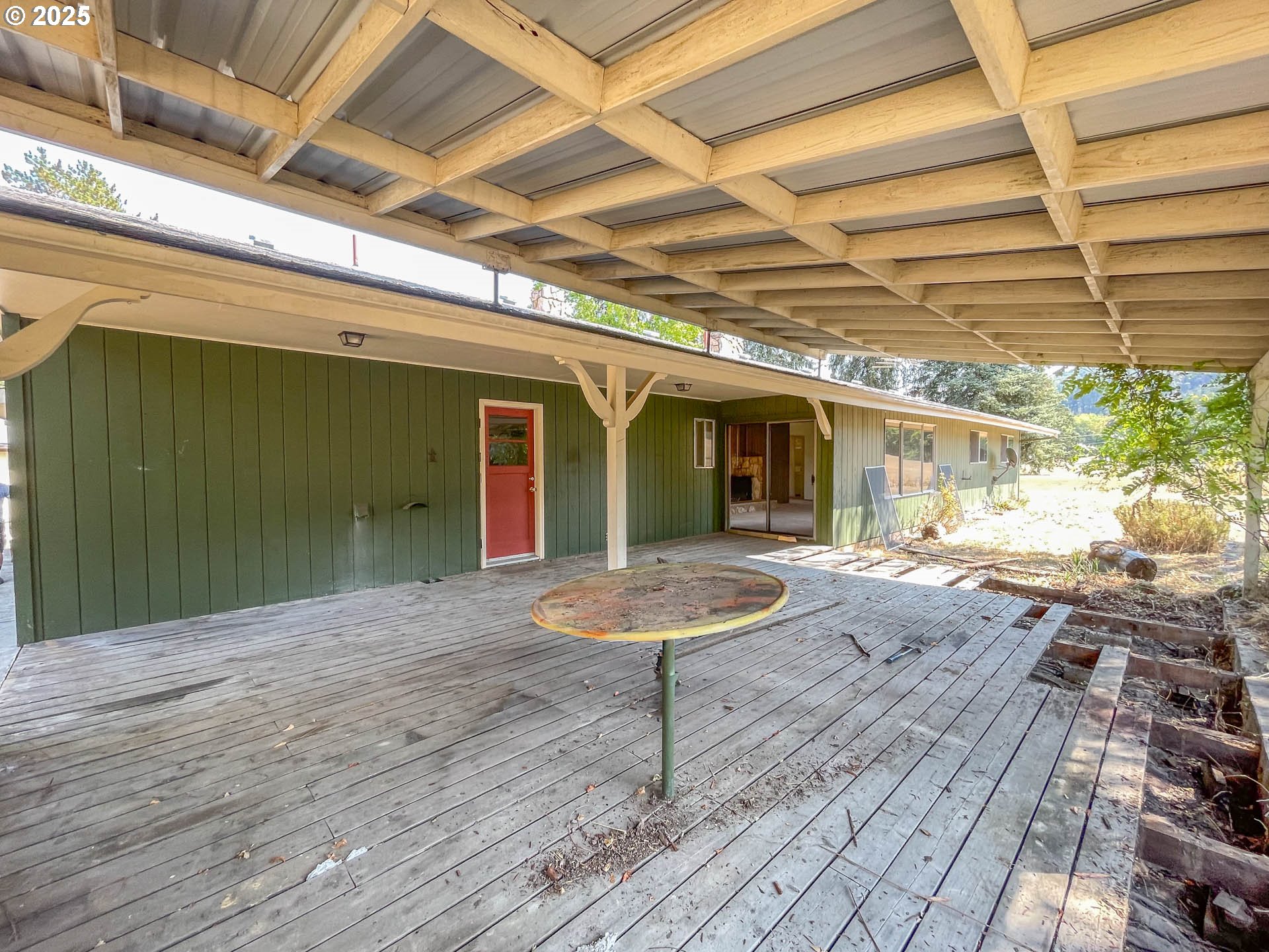 765 O C Brown Road Roseburg, OR 97470 - Photo 33 of 48 a view of a room with wooden floor and chair