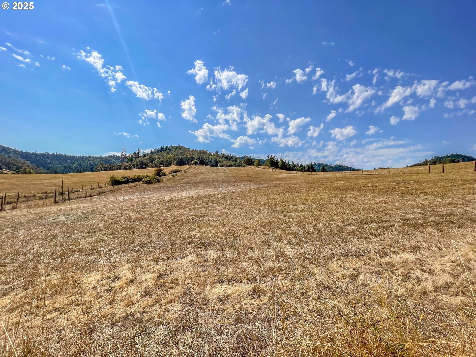 765 O C Brown Road Roseburg, OR 97470 - Photo 39 of 48 a view of an ocean beach and a mountain